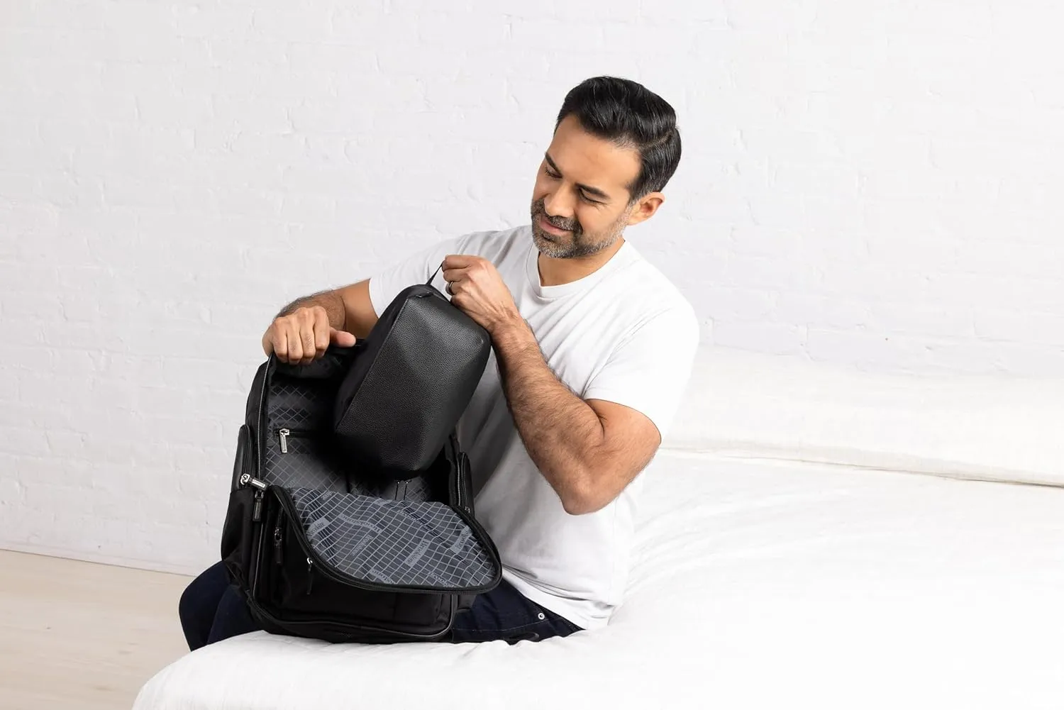 Brookstone Compact Toiletry Kit - Vegan Leather Travel Toiletry Bag with Side Grab Handle - Hygiene Bag Toiletry Organizer, Black
