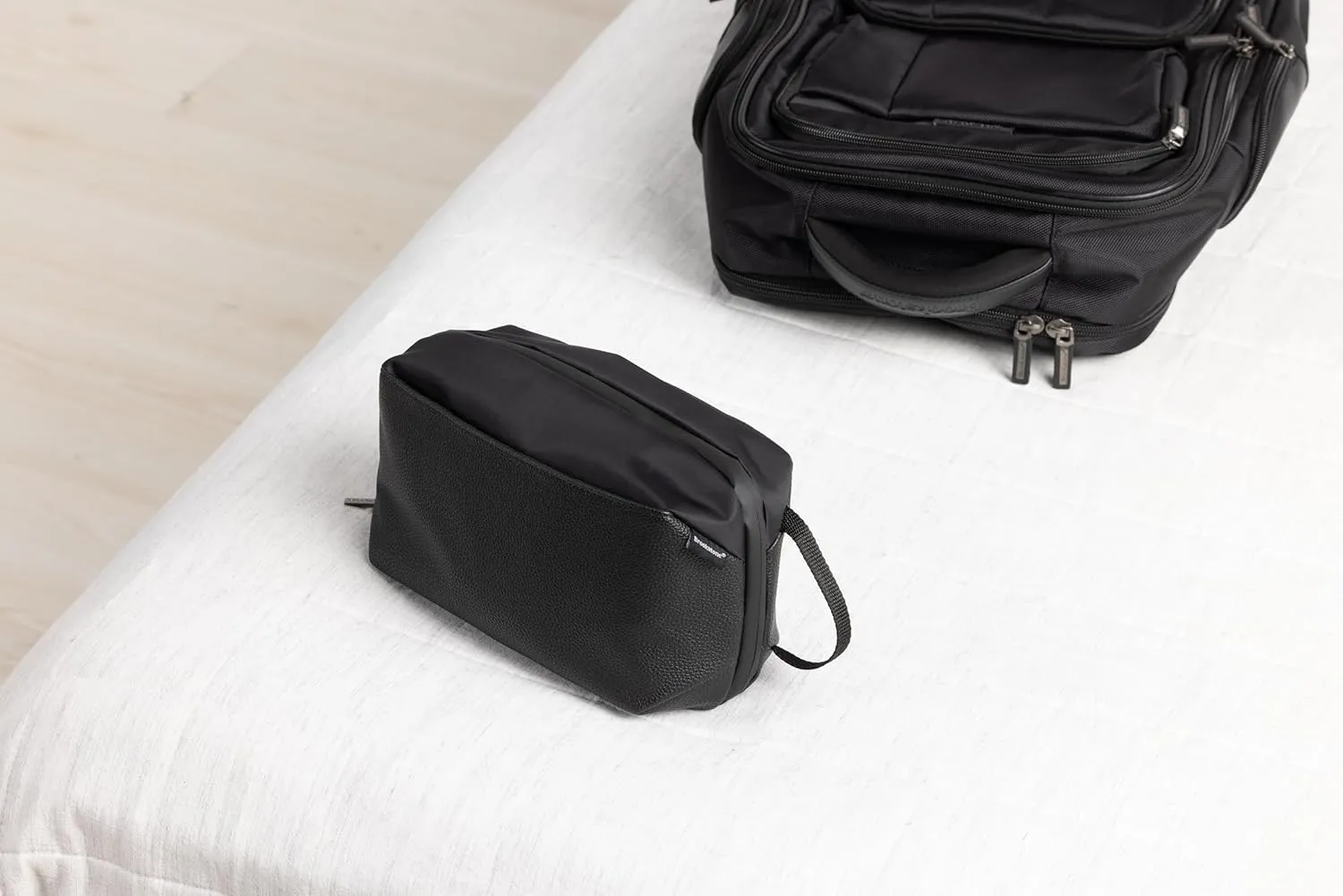 Brookstone Compact Toiletry Kit - Vegan Leather Travel Toiletry Bag with Side Grab Handle - Hygiene Bag Toiletry Organizer, Black