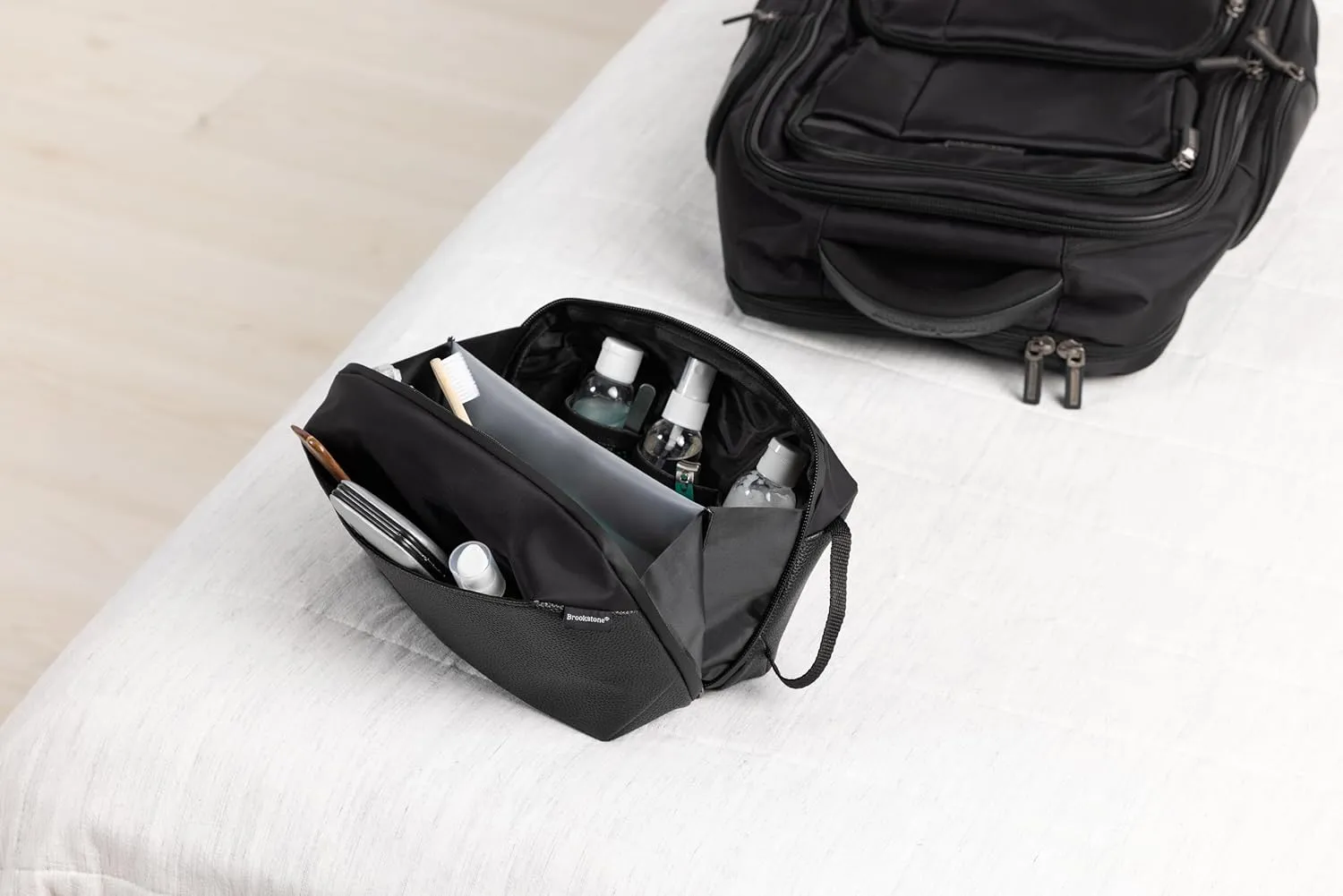 Brookstone Compact Toiletry Kit - Vegan Leather Travel Toiletry Bag with Side Grab Handle - Hygiene Bag Toiletry Organizer, Black