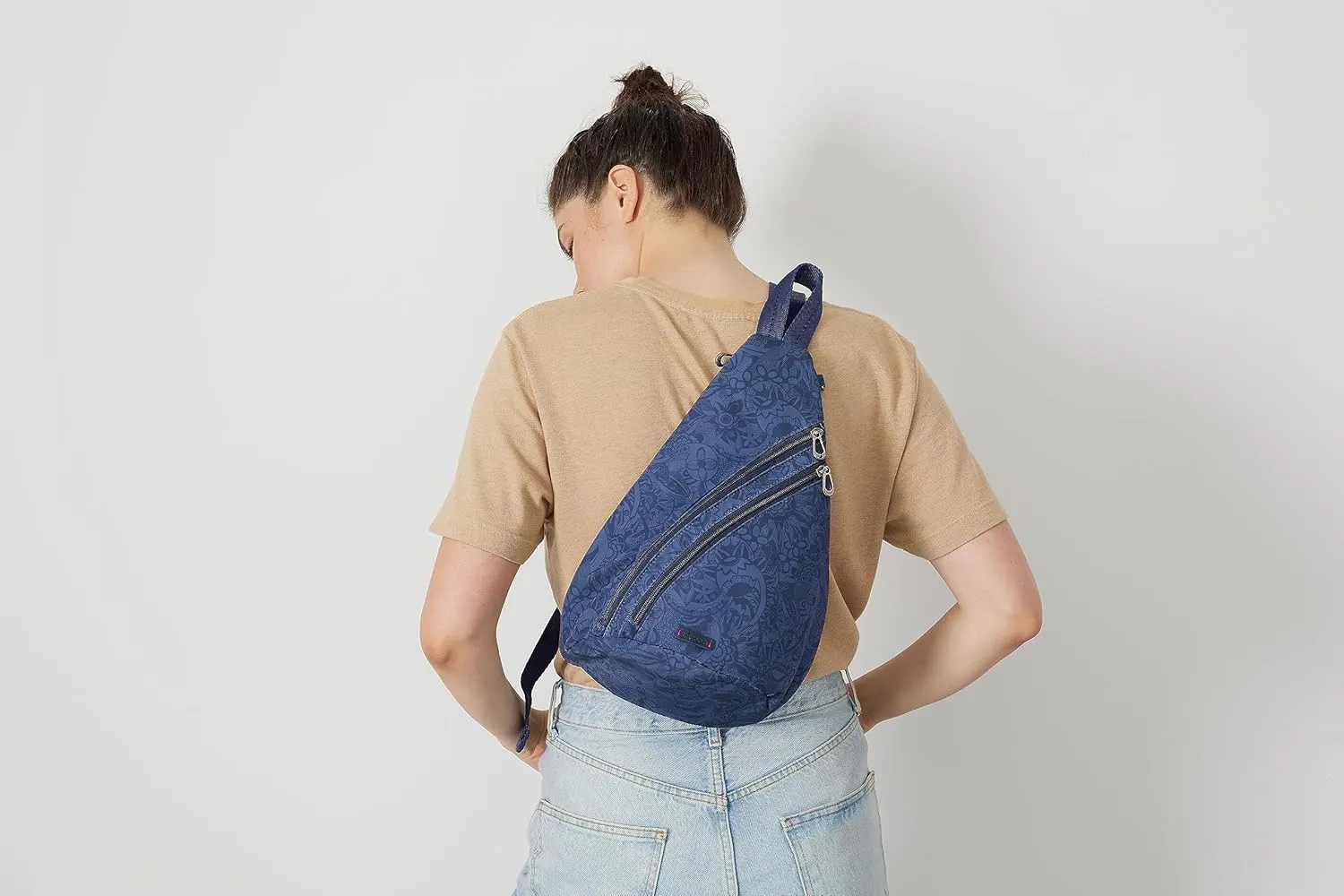Sakroots On The Go Large Sling Backpack in Eco-Twill, Convertible Crossbody Bag, Black Spirit Desert